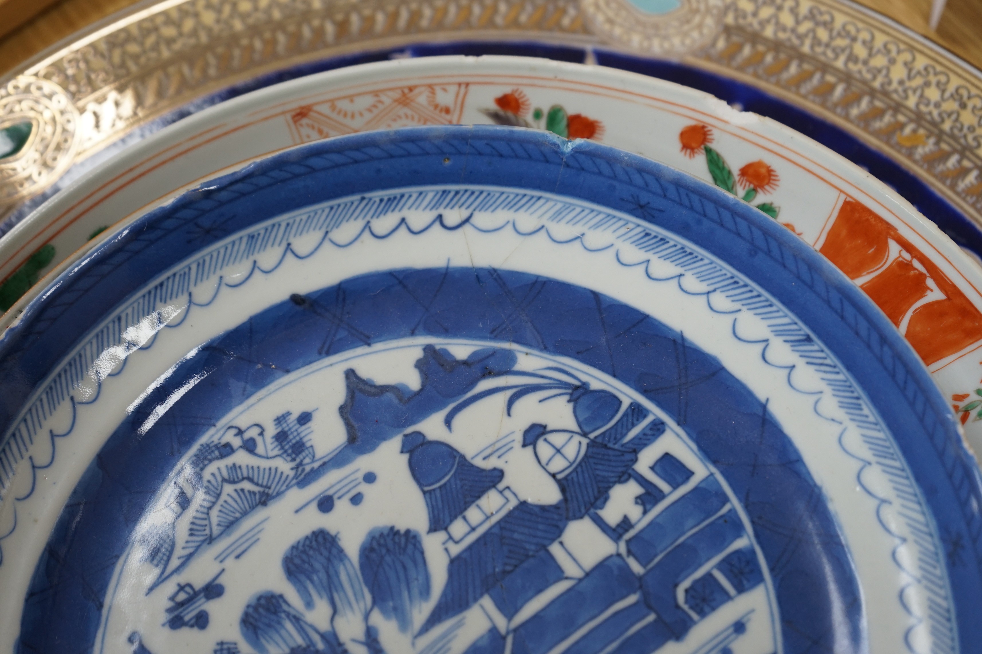 A group of 18th century and later Chinese enamelled and blue and white porcelain dishes and three bowls, Largest dish 35.5 cm diameter